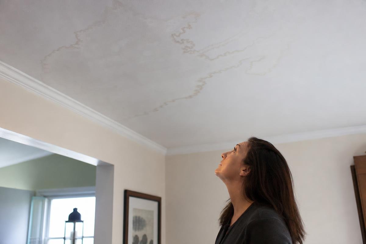 roof leak repair damage on interior ceiling after storm
